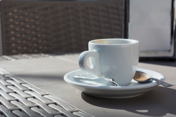 Horizontal View of Close Up of a Cup of Coffee On the Table of an Italian Bar