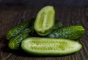 tomatoes and cucumbers are on the table