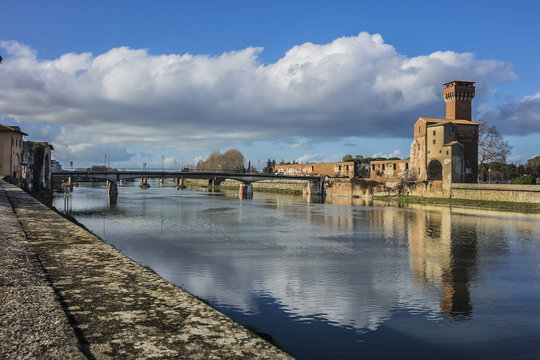Arno River and Citadel. "Cittadella" (Citadel) of Pisa is an ancient fortification where was the ancient Republic Arsenal. Guelph Tower (XV century). Pisa, Tuscany, Italy, Europe.