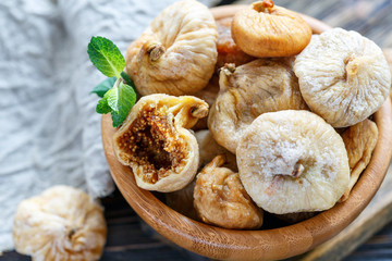 Dried figs in a bowl closeup.