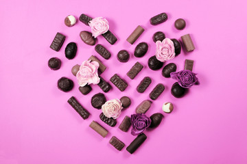 Heart shape made with various types of chocolate.Saint Valentines day concept