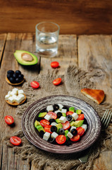 Avocado tomato black olives feta cheese salad