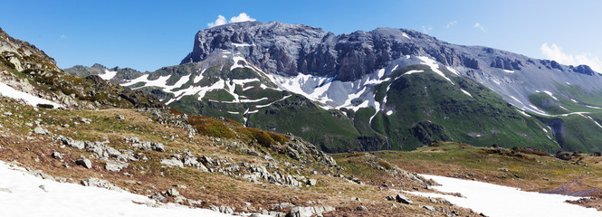 Fototapeta na wymiar Mountain landscape in summer with high peaks.