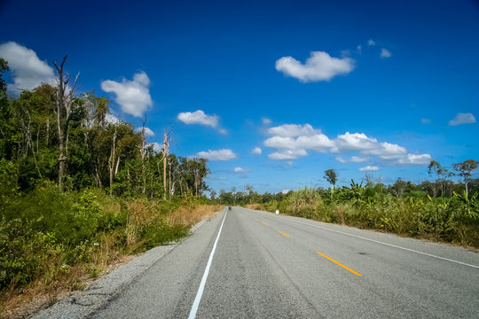 Empty paved road in southern Cambodia