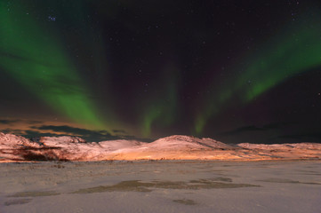 Fototapeta na wymiar Exquisite northern lights, winter landscape.