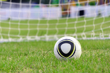 Soccer Bal On Green Field With Net