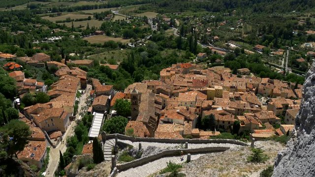 Panoramic view of the old town's rooftops. Moustiers-Sainte-Marie, France. 4K, UHD