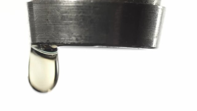 tap water dripping on white background