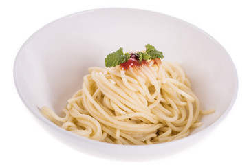 close up of cooked shpaghetti in a white bowl with tomato sauce and herb leave on top 