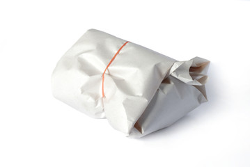 food with paper wrap on white background