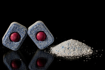 Tablet and powder for the dishwasher. Comparison of two detergents.