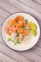 Shrimps with rice and peas. View from above, top, vertical