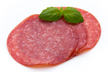 Salami slices isolated on white background.