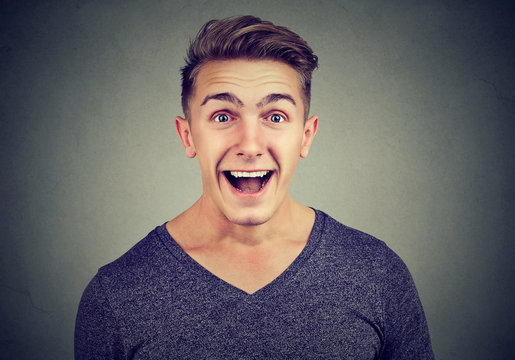 Man excited with surprised face expression