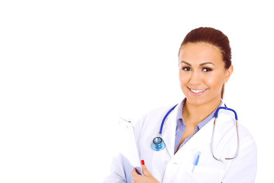 Cheerful young doctor posing on white