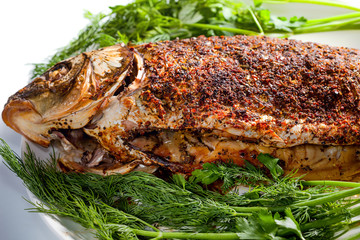 Carp baked with spices