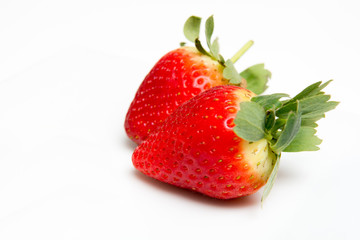 Fresh ripe Strawberries and cream isolated on a white table background