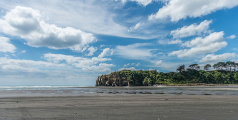Landscape of rocky seashore, cliff and beach
