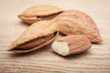 Almond nuts on wooden table
