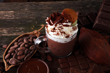 Hot chocolate or coffee with whipped cream in glass