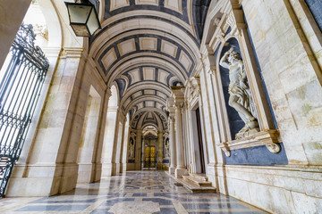 Exterior corridor in main access to Basilica of the Mafra Palace and Convent. Franciscan religious order. Baroque architecture.