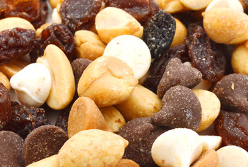Mix nuts, dry fruits and grapes on background