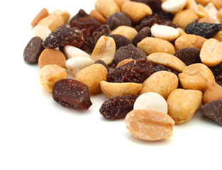 Fototapeta premium Mix nuts, dry fruits and grapes on a white background