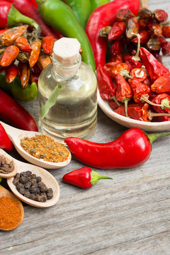 chili pepper, Various spices on old wooden, room for text. toned image. 