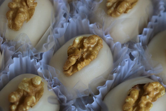 Camafeu, a candy made with Pecan nuts, condensed milk and sugar. Delicious, delicate, tasty delicacies served in birthday parties, weddings, holidays, Valentine's day. Fine treats beautifully set.