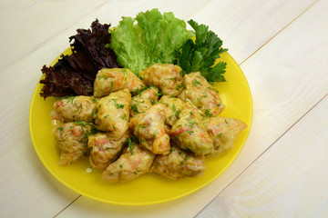 Cabbage rolls stuffed with chicken meat, rice and vegetables. Asian food