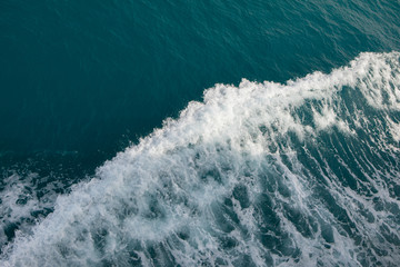 view of nice blue water surface with splash from above