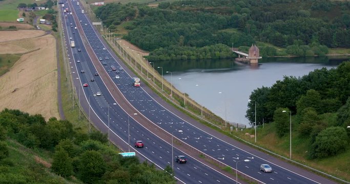 Cars & Lorries On M62 Motorway; M62 And Reflections; West Yorkshire, England