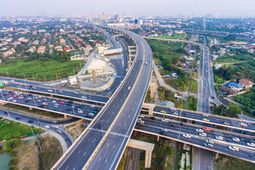 Aerial view of Traffic and Highway on suburban area