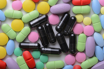 Pharmacy theme. Multicolored Isolated Pills and Capsules