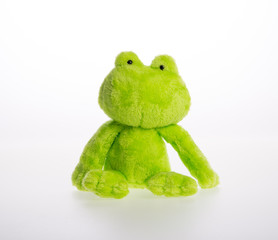 toy or frog soft toy on the background.