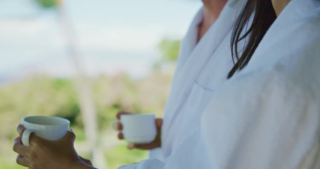 Couple relaxing enjoying morning on vacation at luxury hotel