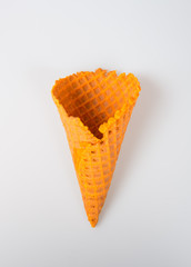 Ice cream cone or empty ice cream cone on background.