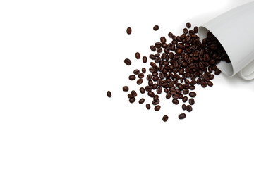 Top view  coffee beans in mug on white background.
