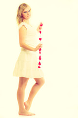 Girl with little red hearts.