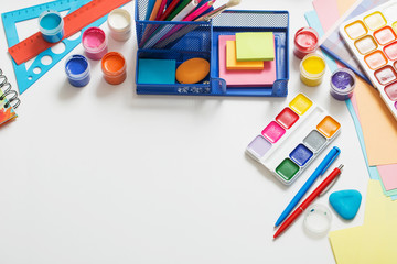 Collection of school supplies on white background