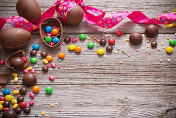 Chocolate Easter Eggs Over Wooden Background