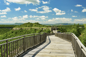 Obraz premium Wooden bridge of ancient fortress. Ovech Fortress, Provadia, Bulgaria