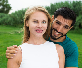 Portrait of smiling couple who are walking