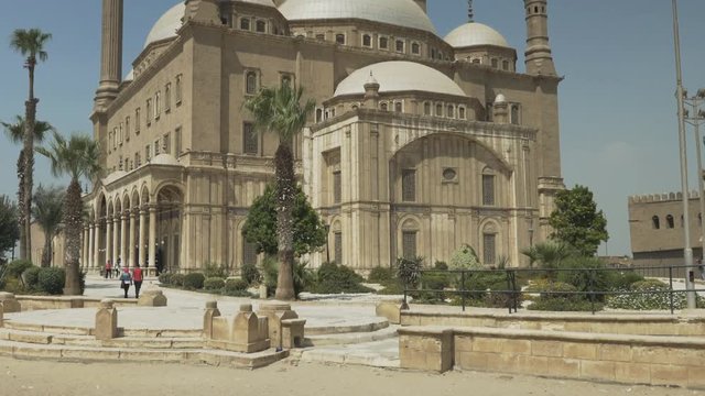 tilt down shot of the exterior of the alabaster mosque in cairo, egypt
