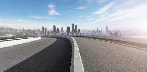 Fototapeta premium Road ground and Chongqing urban architectural landscape skyline