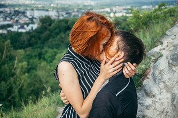 couple have a date on the peak of the hill