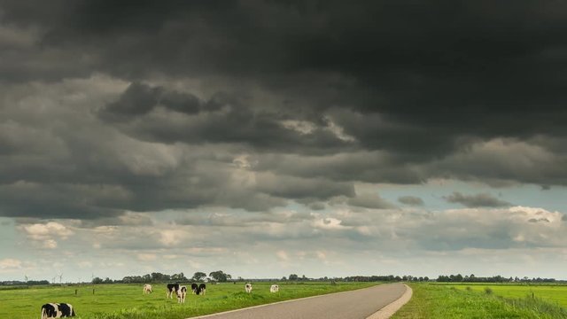Time lapse of Eemnes Polder Clouds with rain and sun.