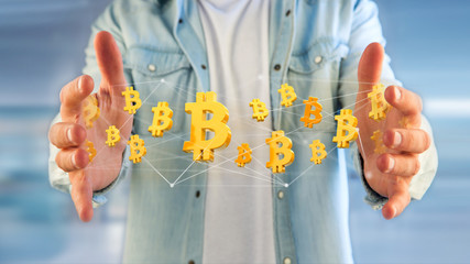 Bitcoin sign flying around a network connection - 3d render
