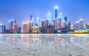 Fototapeta na wymiar Road ground and Chongqing urban architectural landscape skyline