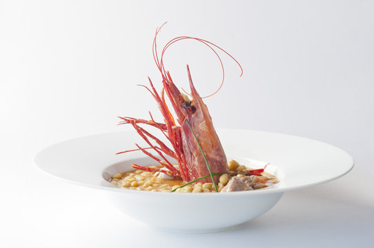 Arroz meloso de carabinero y calamar.
